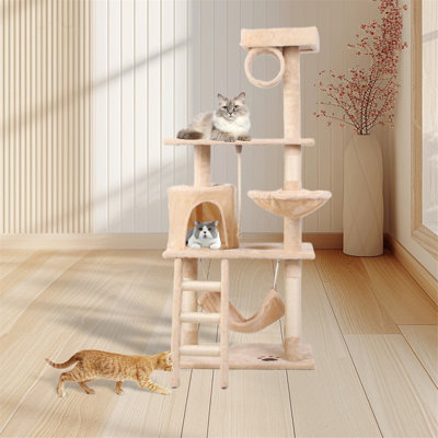 Structure d'escalade à plusieurs niveaux avec poteaux à griffer en sisal et hamacs confortables pour jouer et se détendre