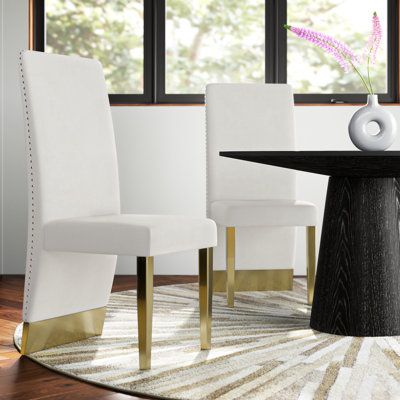 Chaise parsons rembourrée en velours avec garniture cloutée Amine