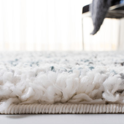 Adam Abstract Ivory/Teal Area Rug