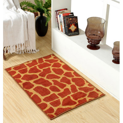 Tapis orange à imprimé animal