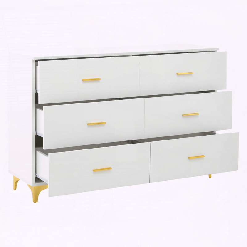 Commode 6 tiroirs blanche avec poignées dorées et pieds en métal