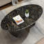 Élégante table basse en marbre de forme ovale-956337649