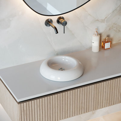 Lavabo de salle de bain circulaire en porcelaine vitreuse tranquility