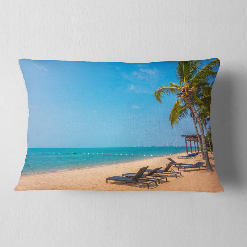 Coussin imprimé plage bleue avec palmiers