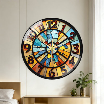 Stained‑glass style wall clock with vibrant mosaic‑tile dial, bold dark numerals, silent‑sweep quartz movement. Bright multi‑toned color blocks bring artistic charm, ideal decorative wall clock for living areas and art‑themed rooms.