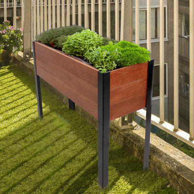 Lit de jardin surélevé rectangulaire en bois d'acacia avec pieds Rinda - brun 36,75 po x 12,75 po x 31 po