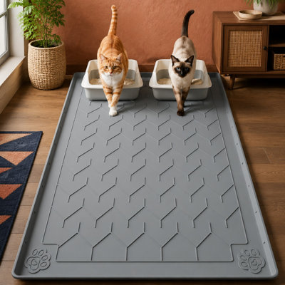 XLarge 40 x 28 in silicone trapping mat with waterproof protection, leakproof raised edges, a non-slip design, scatter control, and a soft paw surface; litter can be removed by shaking or rinsing.
