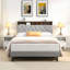 Grand lit plateforme tapissier-395127746