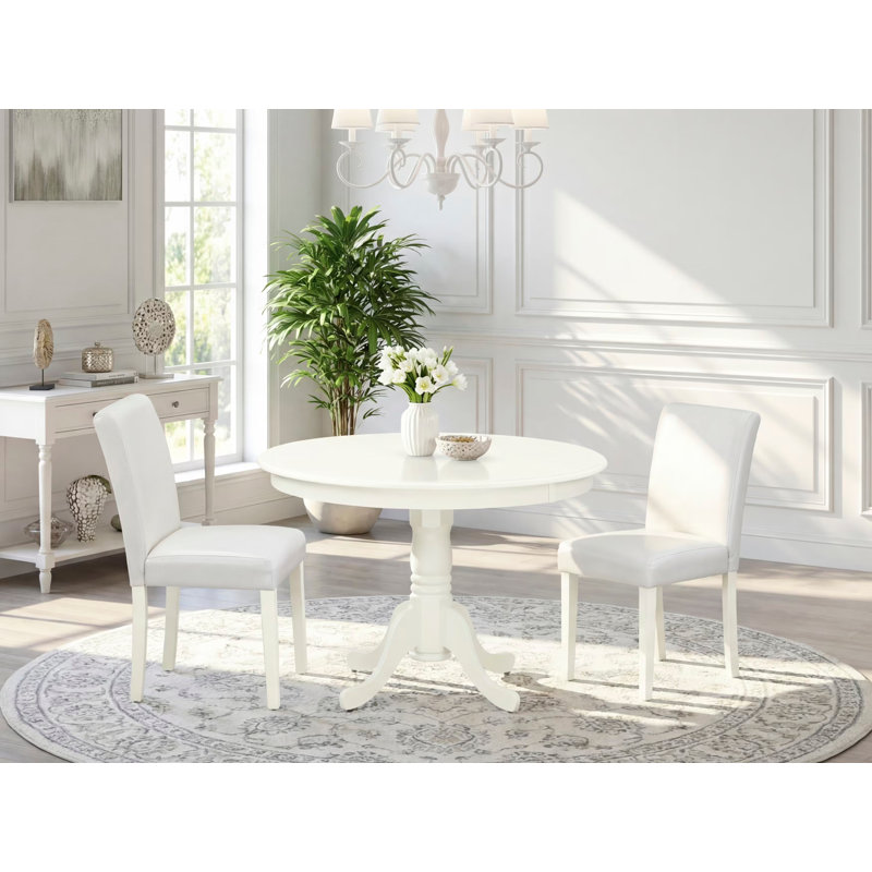 Ensemble de table de cuisine 3 pièces pour petits espaces comprenant une table ronde avec piédestal et 2 chaises rembourrées en similicuir blanc, lin blanc