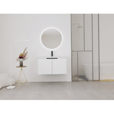 Meuble-lavabo mural avec lavabo en résine et portes à fermeture en douceur, offrant beaucoup de rangement et une conception unique pour rehausser la salle de bain