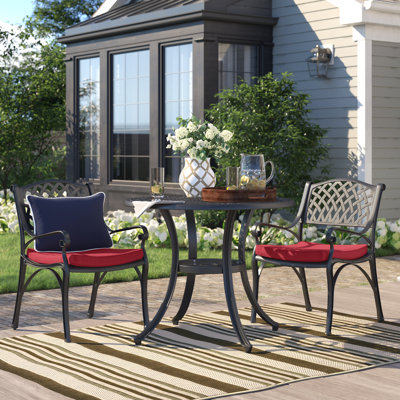 Coddington 2 - Person Patio Dining Set Umbrella Hole Included Round Table with Cushions Included