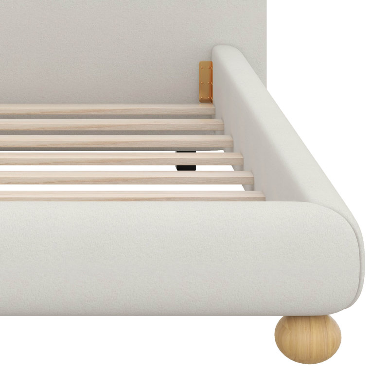 Lit tapissier contemporain avec tissu bouclé en molleton et pieds ronds massifs, design courbé élégant pour la chambre à coucher