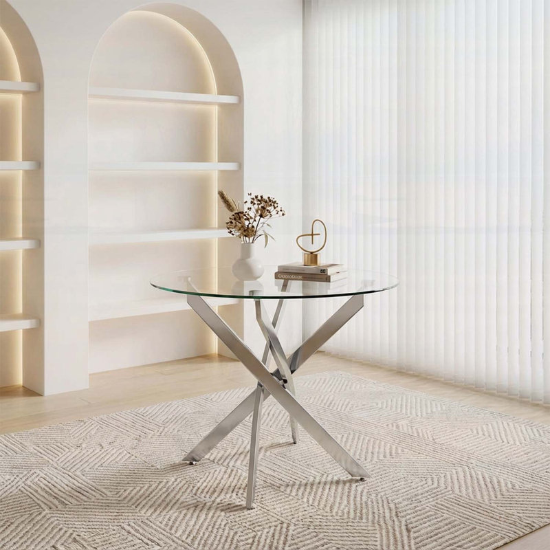 Table de salle à manger ronde en verre avec pieds argentés, parfaite pour les cuisines modernes et les petits espaces, design élégant et sécuritaire