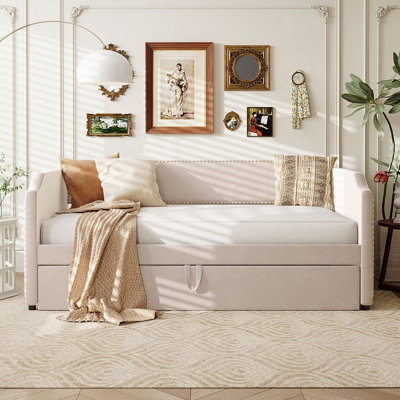 Twin Size Velvet Upholstered Daybed With Pop-Up Trundle For Dual Functionality And Extra Sleeping Space.
