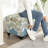 Linen Storage Ottoman With Turned Legs