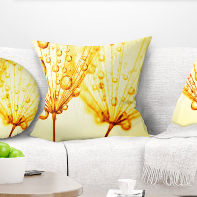 Graines de pissenlit avec gouttes d'eau - coussin à imprimé floral