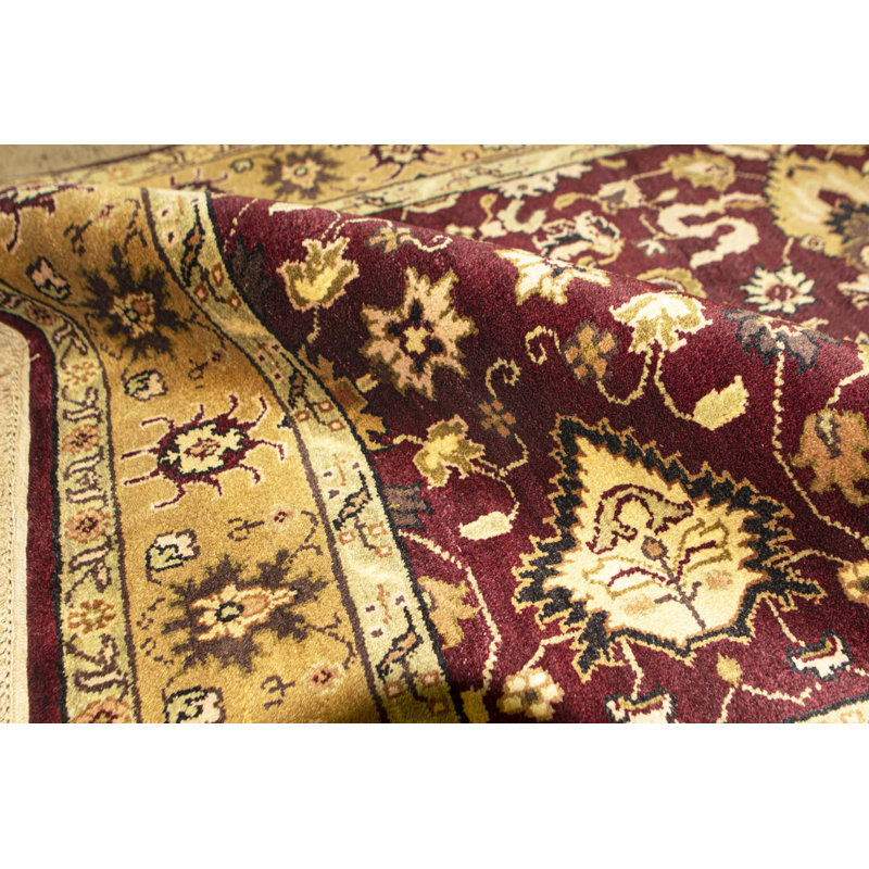 Tapis rouge et or de haute qualité noué à la main