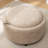 Savinien Upholstered Round Storage Ottoman-873350183