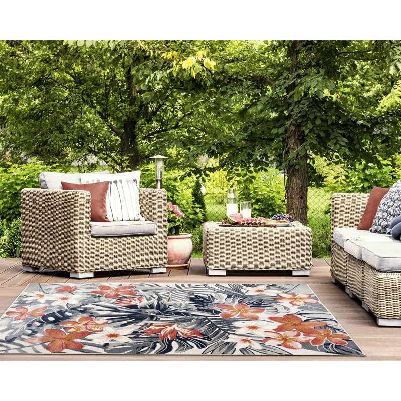 Tapis bleu / orange en polypropylène tissé à la machine Floral, Rectangle 8 pi 8 po x 11 pi 9 po