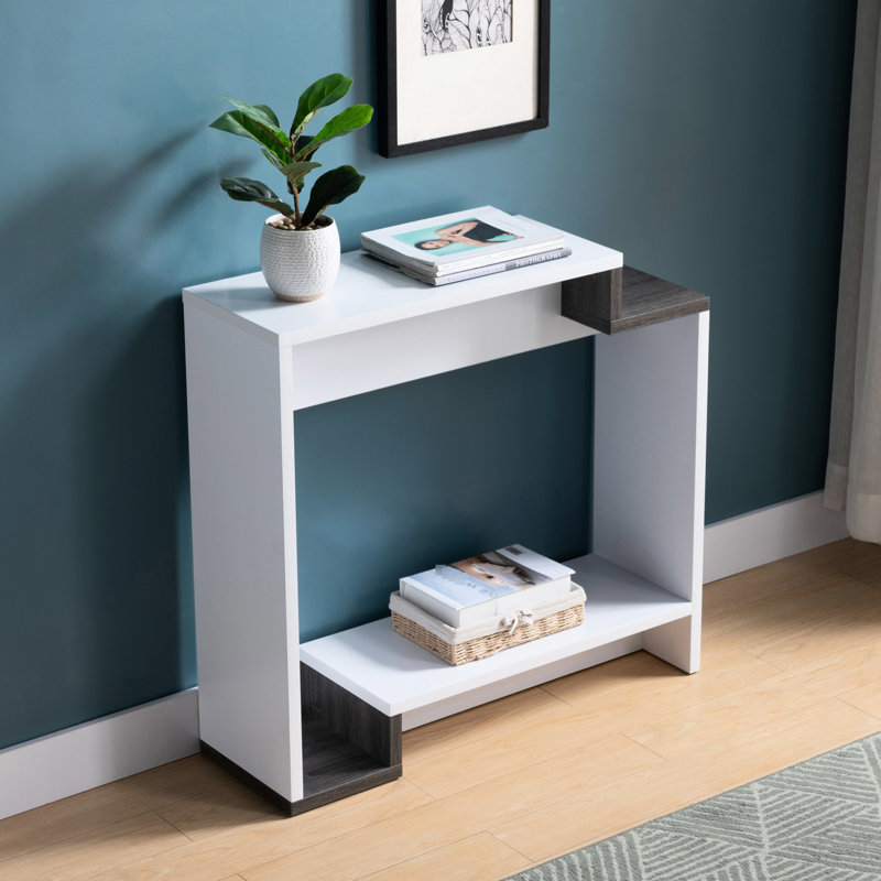Console blanche et grise avec deux compartiments à tablettes ouvertes, structure multi-niveaux, convient aux petits espaces de divertissement, à la composition et à la décoration compacte