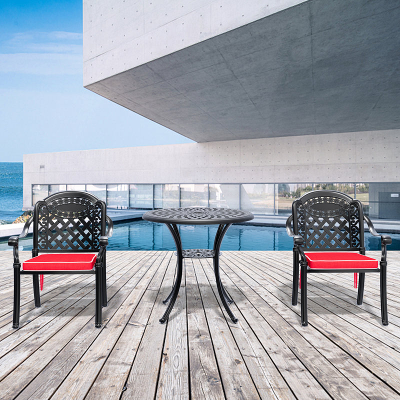 Patio en fonte d'aluminium avec coussins pour les repas en plein air