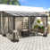 Modern Outdoor Slant-Top Hardtop Gazebo With Black Metal Frame And Curtains