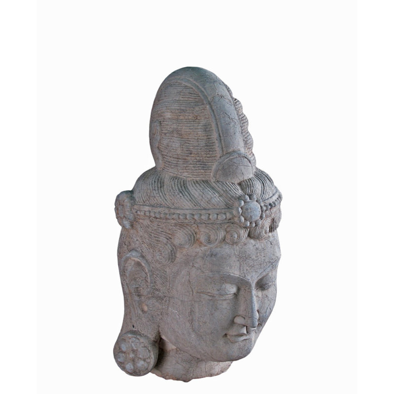 A Stone Statue Of Guanyin Head