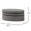 Table basse ovale rotative avec des couches et des surfaces d'aspect contemporain