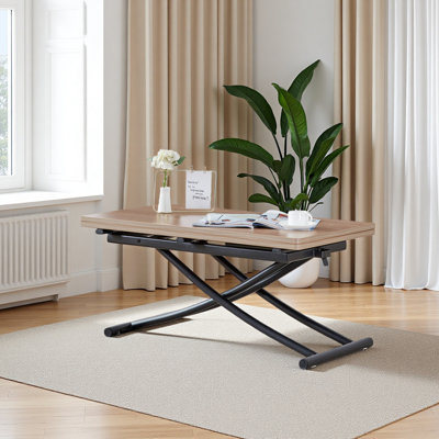 La table de levage moderne et minimaliste moderne, avec un bureau autocollant de grain de bois de 0,8 pouce et des pieds en métal noir, peut être utilisée comme coiffeuse, table basse, table de salle à manger et table de bureau