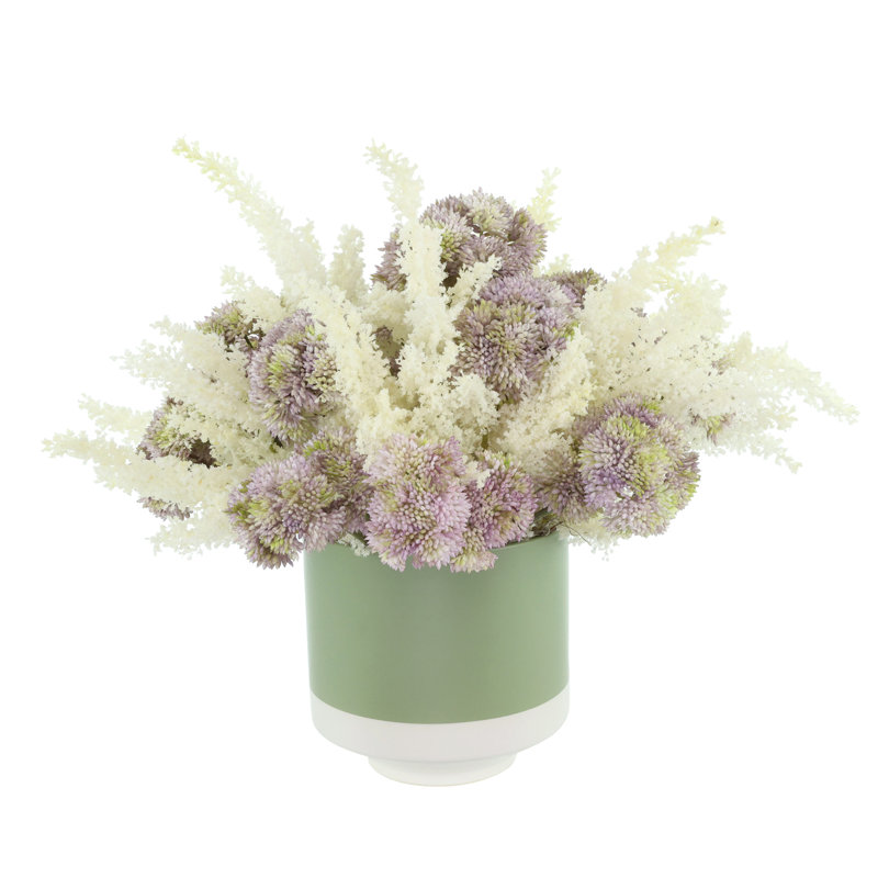 Sedum et pampas disposés dans un pot en céramique