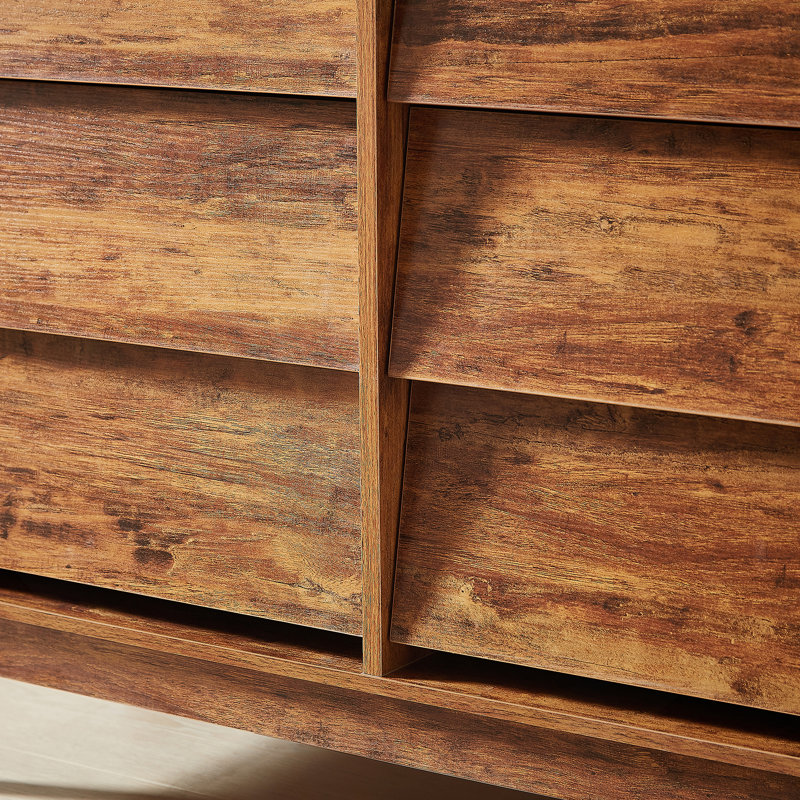 La commode double 6 tiroirs présente un design rétro et biseauté