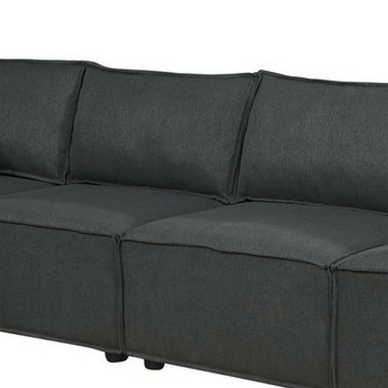 Canapé modulaire confortable avec méridienne réversible et coussins moelleux, idéal pour la détente