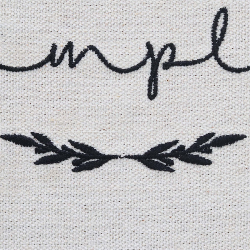 Décoration murale Live simplement avec cintre en jute et perles