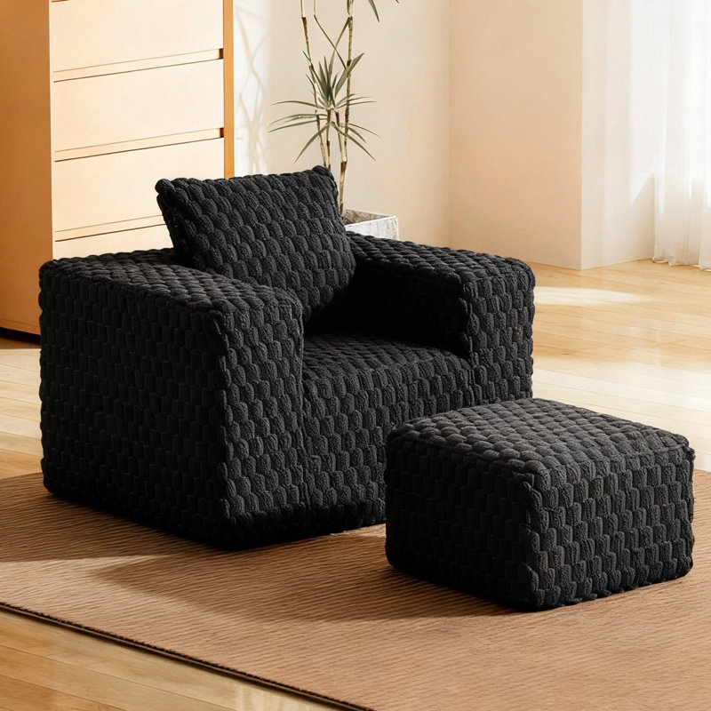 Fauteuil d'appoint moderne en velours côtelé peu encombrant, canapé simple noir avec repose-pieds, idéal pour les espaces de vie compacts