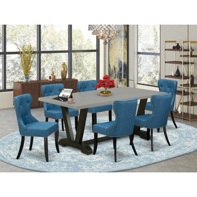 L'ensemble de table de salle à manger 7 pièces se compose d'une table rectangulaire en lin blanc et de 6 chaises de cuisine Limelight en tissu de lin au fini jacobien vieilli