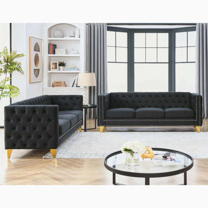 Canapé en velours pour le salon avec boutons capitonnés à accoudoirs carrés, alliant confort et élégance pour les intérieurs modernes