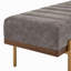 Banquette rembourrée capitonnée avec pieds dorés