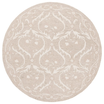 Antoiniece Tufted Wool/Cotton Damask Rug in Beige/Ivory