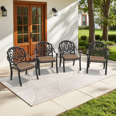 Cast Aluminum Patio Stacking Armchair 4PCS With Black Frame And Cushions In Brown Colors by World Menagerie