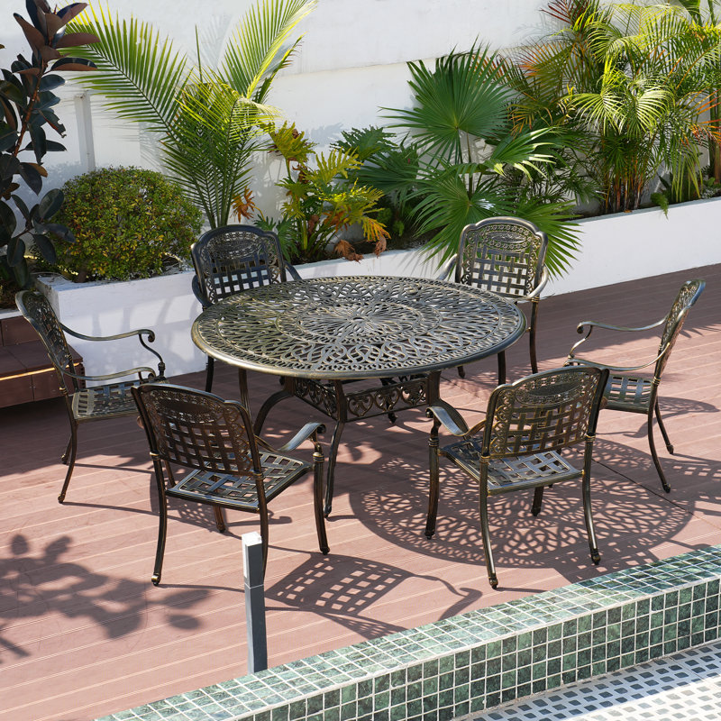 Tovin 6 - Person Patio Dining Set with Round Table