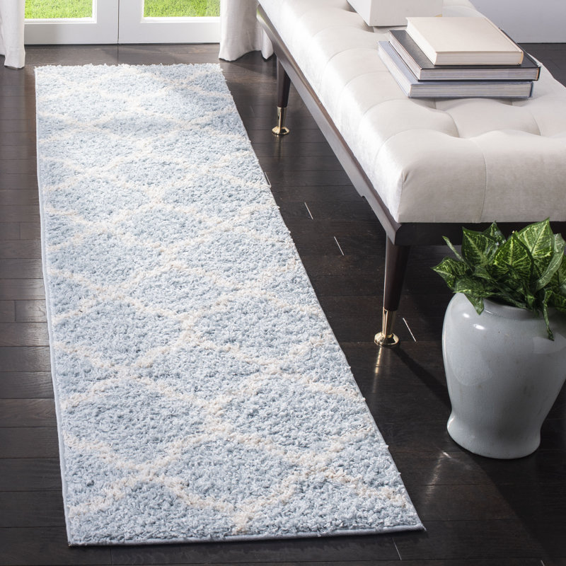 Tapis bleu en polypropylène à motif géométrique Helsel, Tapis de couloir 2 pi x 8 pi