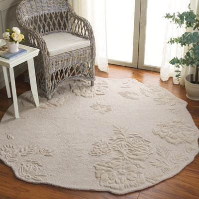 Devna Hand Tufted Wool/Cotton Floral Rug in Ivory