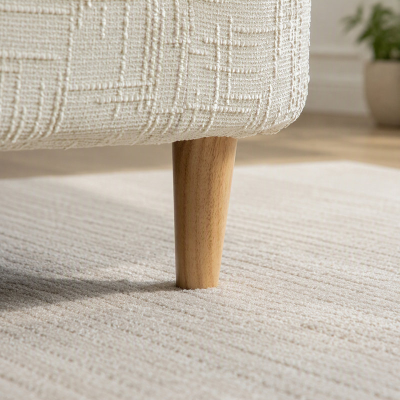 Banc de lit moderne capitonné avec accoudoirs et coussins cylindriques