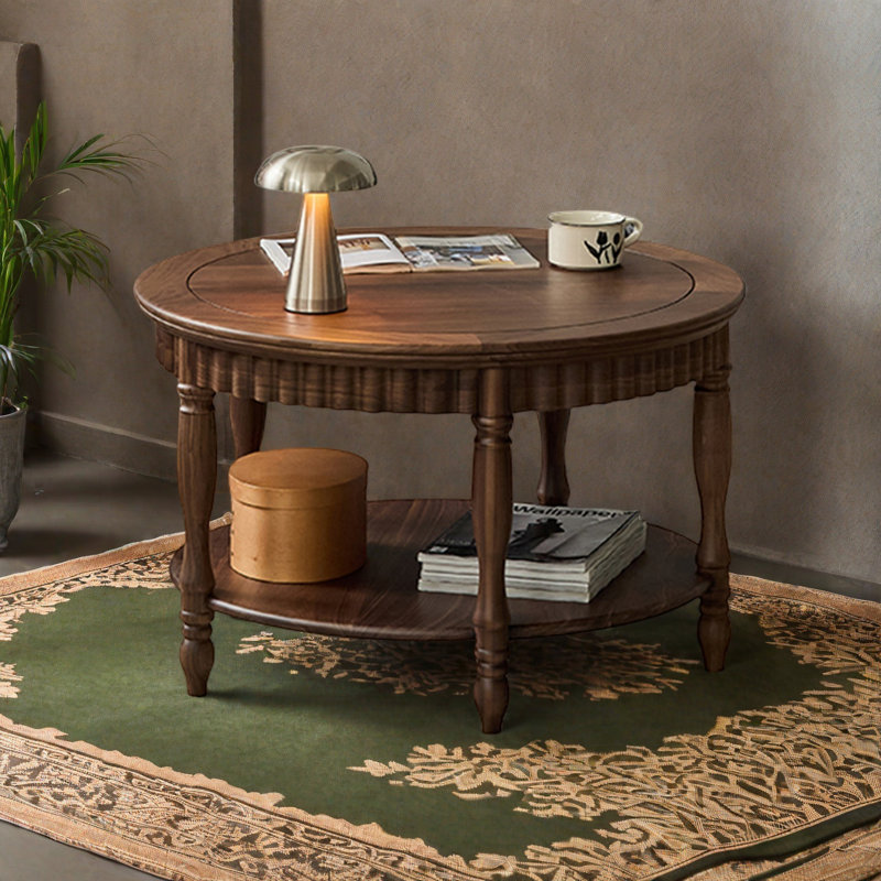 Table ronde à deux niveaux en noyer noir
