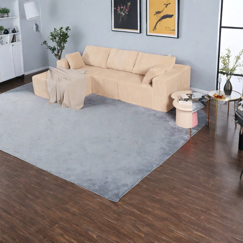 Canapé modulaire beige, rembourré de mousse, forme en L moderne avec méridienne pour la maison