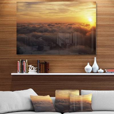 " Yellow Sunrise Above Clouds "