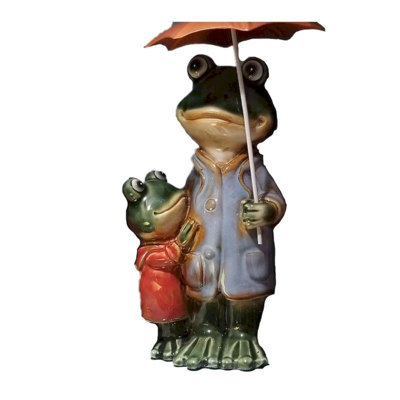 Figurine grenouille et enfant sous un parapluie