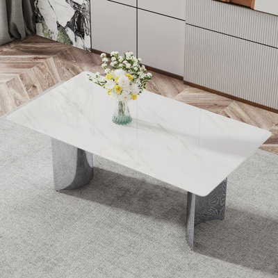 Modern Minimalist Dining Table. The White Imitation Marble Glass Desktop Is Equipped With Silver Metal Legs. Suitable For Restaurants And Living Rooms