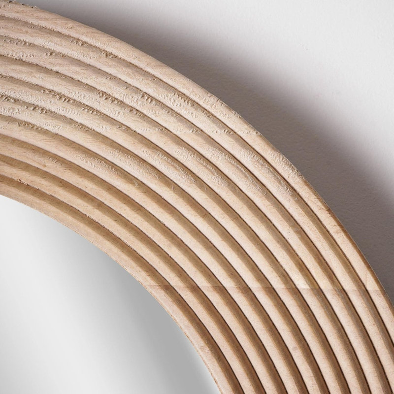Miroir mural ovale en bois sculpté