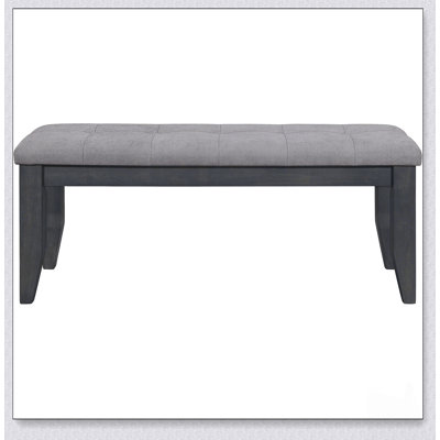 Charmant banc de salle à manger rembourré gris foncé avec rembourrage moelleux et pieds fuselés pour une assise confortable